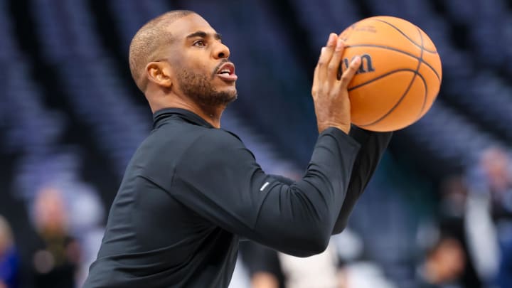 Warriors guard Chris Paul warms up before a game against the Dallas Mavericks at American Airlines Center in April.
