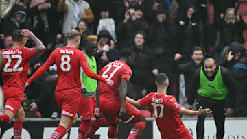 Jamie Donley celebrates his goal against Manchester City 
