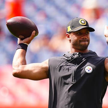 Sep 15, 2024; Denver, Colorado, USA; Pittsburgh Steelers quarterback Russell Wilson (3) warms up before a game against the Denver Broncos at Empower Field at Mile High. Mandatory Credit: Ron Chenoy-Imagn Images