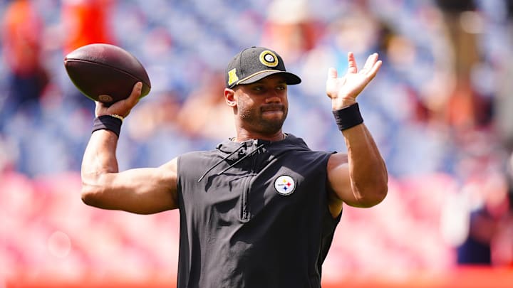 Sep 15, 2024; Denver, Colorado, USA; Pittsburgh Steelers quarterback Russell Wilson (3) warms up before a game against the Denver Broncos at Empower Field at Mile High. Mandatory Credit: Ron Chenoy-Imagn Images