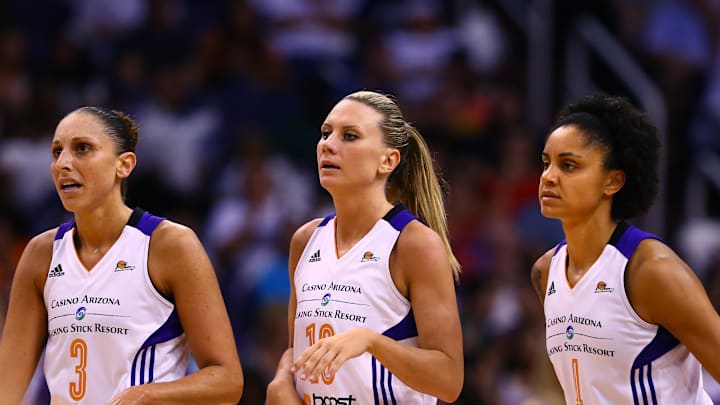 Sep 9, 2014; Phoenix, AZ, USA; Phoenix Mercury guard Diana Taurasi (3), forward Penny Taylor (13) and forward Candice Dupree (4) against the Chicago Sky during game two of the WNBA Finals at US Airways Center. The Mercury defeated the Sky 97-68. Mandatory Credit: Mark J. Rebilas-Imagn Images