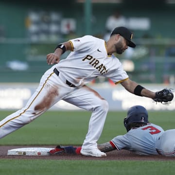 Sep 5, 2024; Pittsburgh, Pennsylvania, USA;  Washington Nationals right fielder Dylan Crews (3) steals second base ahead of a tag attempt by Pittsburgh Pirates shortstop Isiah Kiner-Falefa (7) during the first inning at PNC Park. Mandatory Credit: Charles LeClaire-Imagn Images