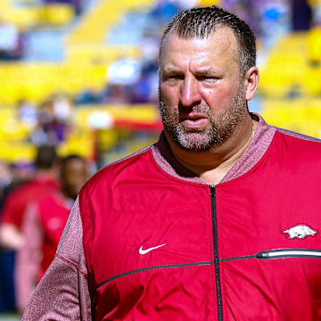 Arkansas Razorbacks head coach Bret Bielema walks the sidelines against LSU during the game at Tiger Stadium.