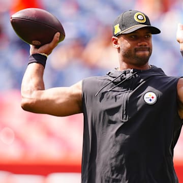 Sep 15, 2024; Denver, Colorado, USA; Pittsburgh Steelers quarterback Russell Wilson (3) warms up before a game against the Denver Broncos at Empower Field at Mile High. Mandatory Credit: Ron Chenoy-Imagn Images