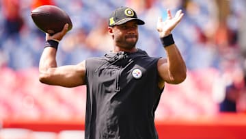 Sep 15, 2024; Denver, Colorado, USA; Pittsburgh Steelers quarterback Russell Wilson (3) warms up before a game against the Denver Broncos at Empower Field at Mile High. Mandatory Credit: Ron Chenoy-Imagn Images