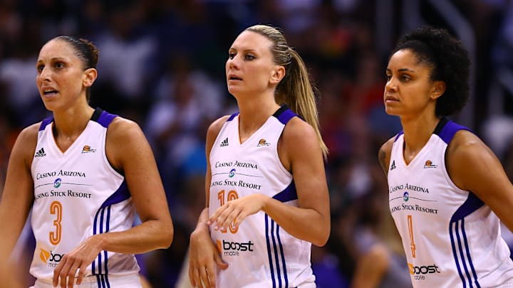 Sep 9, 2014; Phoenix, AZ, USA; Phoenix Mercury guard Diana Taurasi (3), forward Penny Taylor (13) and forward Candice Dupree (4) against the Chicago Sky during game two of the WNBA Finals at US Airways Center. The Mercury defeated the Sky 97-68. Mandatory Credit: Mark J. Rebilas-Imagn Images