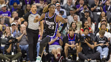 Apr 13, 2025; Sacramento, California, USA;  Sacramento Kings guard Keon Ellis (23) reacts after he scored against the Phoenix Suns during the third quarter at Golden 1 Center. Mandatory Credit: John Hefti-Imagn Images