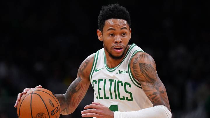 Boston Celtics guard Anfernee Simons (4) drives the ball against the Washington Wizards in the second half at TD Garden. 