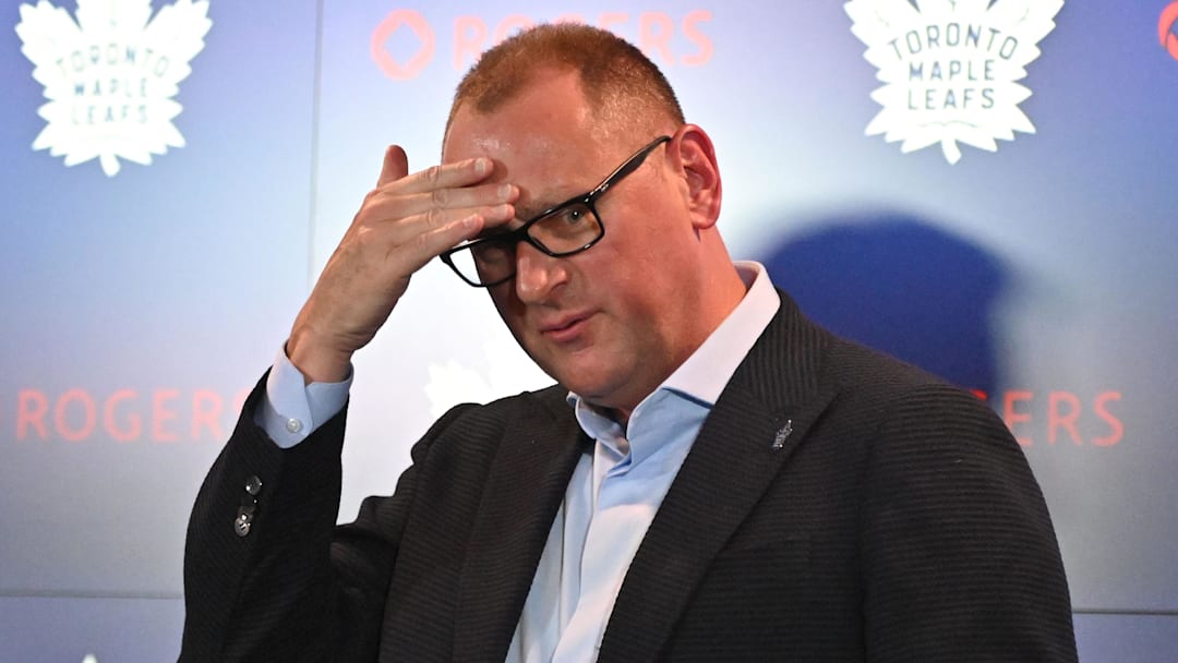 Jun 1, 2023; Toronto, Ontario, CANADA; Toronto Maple Leafs new general manager Brad Treliving is introduced by club president Brendan Shanahan (left) at a press conference at Scotiabank Arena. Mandatory Credit: Dan Hamilton-Imagn Images