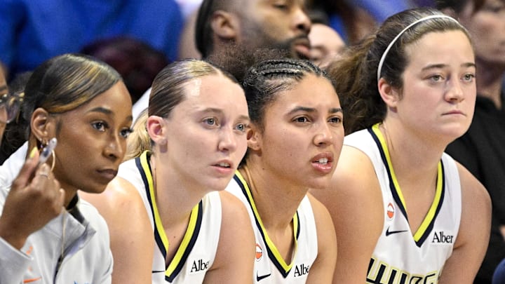 May 14, 2026; Arlington, Texas, USA; (from left) Dallas Wings guard Paige Bueckers (5) and guard Azzi Fudd (35) and forward Maddy Siegrist (20) look on from the bench during the second half against the Minnesota Lynx at College Park Center. Mandatory Credit: Jerome Miron-Imagn Images
