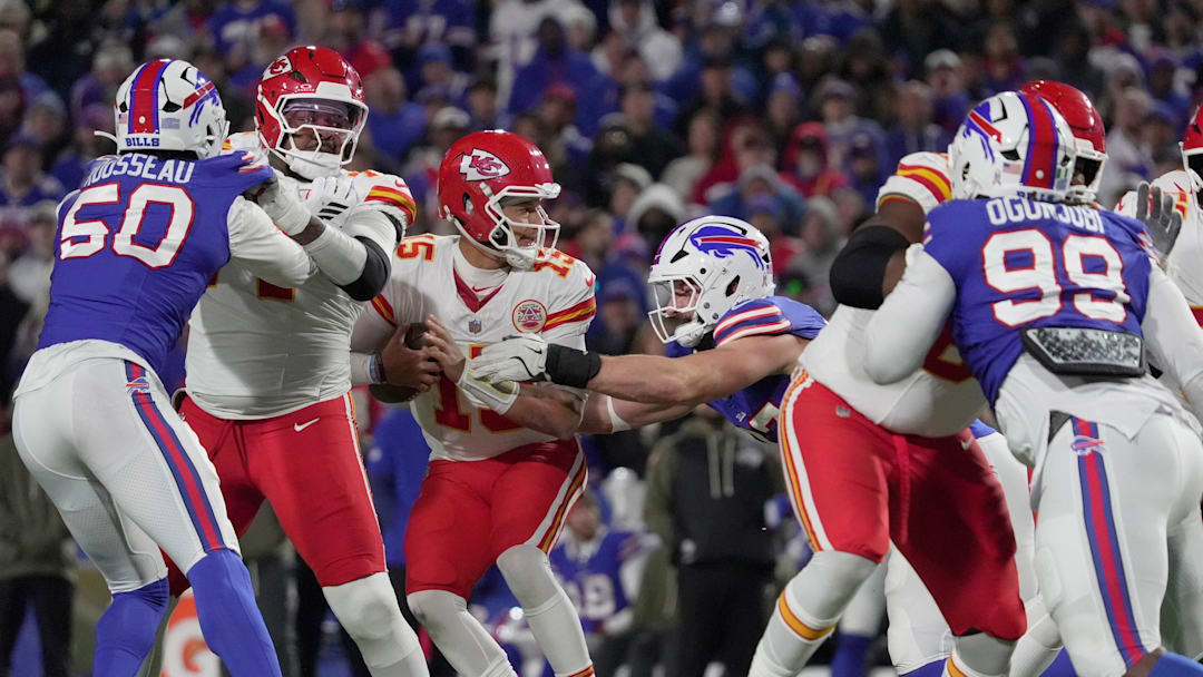 Buffalo Bills defensive end Joey Bosa gets a hold of Kansas City Chiefs quarterback Patrick Mahomes and forces him to give up throwing a pass during second half action against the Kansas City Chiefs.