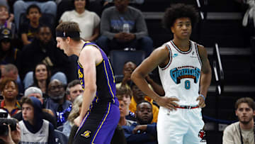 Mar 29, 2025; Memphis, Tennessee, USA; Los Angeles Lakers guard Austin Reaves (15) reacts after a basket during the fourth quarter against the Memphis Grizzlies at FedExForum. Mandatory Credit: Petre Thomas-Imagn Images