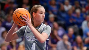 Kansas State junior guard Serena Sundell (4) grabs a rebound in the first half of the Sunflower Showdown game against Kansas Sunday, Feb. 25, 2024 inside Allen Fieldhosue.