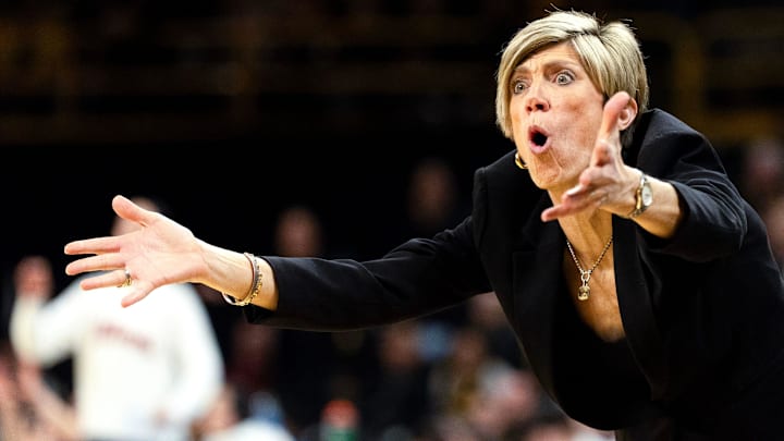 Iowa head coach Jan Jensen reacts during a basketball game against the Illinois Fighting Illini Feb. 26, 2026 at Carver-Hawkeye Arena in Iowa City, Iowa.