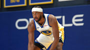 Sep 29, 2025; San Francisco, CA, USA; Golden State Warriors guard Moses Moody (4) dribbles the ball during Media Day at the Chase Center. Mandatory Credit: Cary Edmondson-Imagn Images