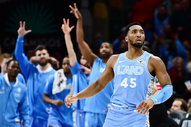 Donovan Mitchell (45) celebrates after hitting a three point basket
