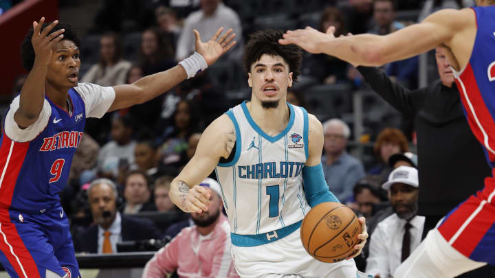 Jan 24, 2024; Detroit, Michigan, USA;  Charlotte Hornets guard LaMelo Ball (1) dribbles defended by Detroit Pistons forward Ausar Thompson (9) in the second half at Little Caesars Arena. Mandatory Credit: Rick Osentoski-USA TODAY Sports