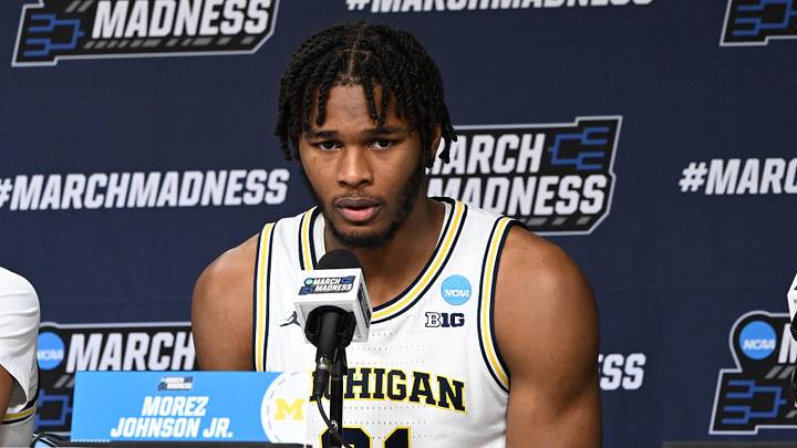 Mar 19, 2026; Buffalo, NY, USA; Michigan Wolverines forward Morez Johnson Jr. (21) speaks to the media after a first round game of the men's 2026 NCAA Tournament against the Howard Bison at Keybank Center. Mandatory Credit: Mark Konezny-Imagn Images