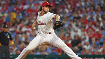 Sep 1, 2024; Philadelphia, Pennsylvania, USA; Philadelphia Phillies pitcher Aaron Nola (27) throws a pitch during the second inning against the Atlanta Braves at Citizens Bank Park. Mandatory Credit: Eric Hartline-Imagn Images