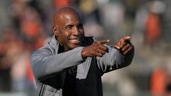 Aug 12, 2023; San Francisco, California, USA; San Francisco Giants former left fielder Barry Bonds gestures on the field before the game against the Texas Rangers at Oracle Park. 
