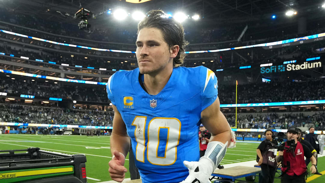 Dec 8, 2025; Inglewood, California, USA; Los Angeles Chargers quarterback Justin Herbert (10) runs off field after defeating the Philadelphia Eagles in overtime at SoFi Stadium. 