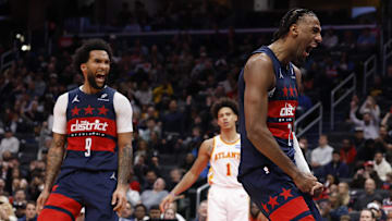Nov 25, 2025; Washington, District of Columbia, USA; Washington Wizards center Alex Sarr (20) reacts after a dunk alongside Wizards forward Justin Champagnie (9) against the Atlanta Hawks in the second half at Capital One Arena. Mandatory Credit: Geoff Burke-Imagn Images