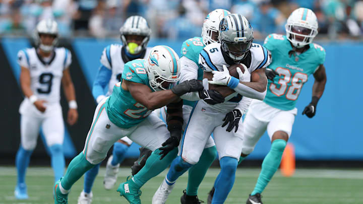 Carolina Panthers running back Rico Dowdle (5) carries the ball during the second quarter against the Miami Dolphins at Bank of America Stadium. 