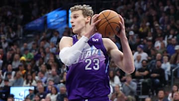 Nov 14, 2024; Salt Lake City, Utah, USA; Utah Jazz forward Lauri Markkanen (23) rebounds the ball against the Dallas Mavericks during the fourth quarter at Delta Center. Mandatory Credit: Rob Gray-Imagn Images