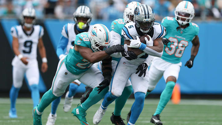 Carolina Panthers running back Rico Dowdle (5) carries the ball during the second quarter against the Miami Dolphins at Bank of America Stadium. Carolina Panthers running back Rico Dowdle (5) carries the ball during the second quarter against the Miami Dolphins at Bank of America Stadium.