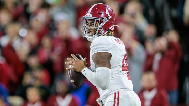 Nov 23, 2024; Norman, Oklahoma, USA; Alabama Crimson Tide quarterback Jalen Milroe (4) passes the ball during the fourth quarter against the Oklahoma Sooners at Gaylord Family-Oklahoma Memorial Stadium. Mandatory Credit: William Purnell-Imagn Images Nov 23, 2024; Norman, Oklahoma, USA; Alabama Crimson Tide quarterback Jalen Milroe (4) passes the ball during the fourth quarter against the Oklahoma Sooners at Gaylord Family-Oklahoma Memorial Stadium. Mandatory Credit: William Purnell-Imagn Images