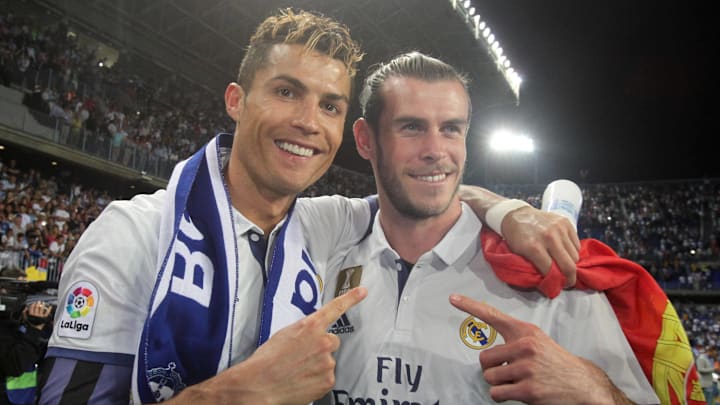 Cristiano Ronaldo (left) and Gareth Bale helped Real Madrid achieve a historic Champions League threepeat.