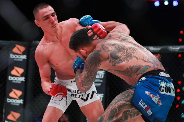 Aaron Pico (red gloves) and Henry Corrales (blue gloves) during Bellator 214 at The Forum. 