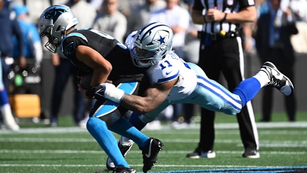 Dallas Cowboys linebacker Micah Parsons (11) sacks Carolina Panthers quarterback Bryce Young (9) 