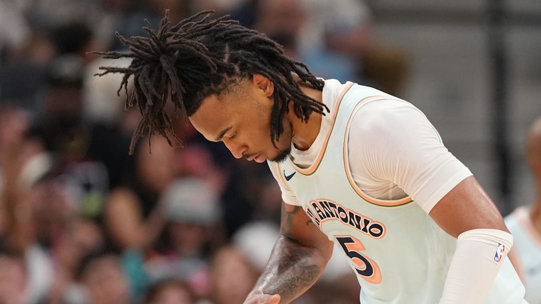 Apr 13, 2025; San Antonio, Texas, USA; San Antonio Spurs guard Stephon Castle (5) reacts after scoring a three point basket during the first half against the Toronto Raptors at Frost Bank Center. Mandatory Credit: Scott Wachter-Imagn Images