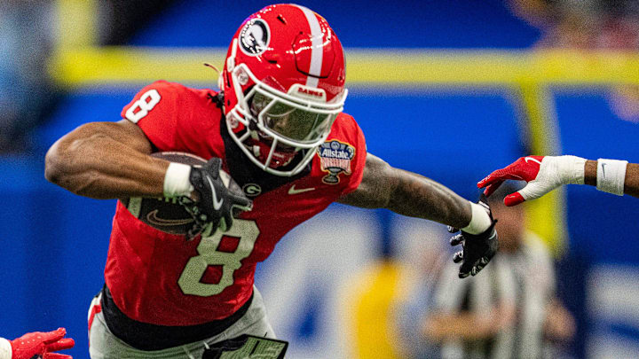 Georgia wide receiver Colbie Young (8) carries the ball after coming down with it from a pass during the Sugar Bowl and College Football Playoff quarterfinals at Caesars Superdome in New Orleans, La., on Thursday, Jan. 1, 2026. Ole Miss defeated Georgia 39-34.
