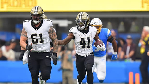 New Orleans Saints center Connor McGovern and running back Alvin Kamara