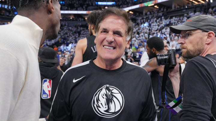 May 24, 2024; Minneapolis, Minnesota, USA; Dallas Mavericks owner Mark Cuban celebrates after defeating the Minnesota Timberwolves in game two of the western conference finals for the 2024 NBA playoffs at Target Center. Mandatory Credit: Brad Rempel-USA TODAY Sports