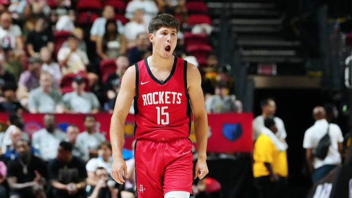 Jul 14, 2024; Las Vegas, NV, USA; Houston Rockets guard Reed Sheppard (15) reacts after scoring against the Washington Wizards during the third quarter at Thomas & Mack Center. Mandatory Credit: Stephen R. Sylvanie-USA TODAY Sports