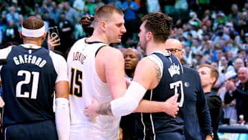Mar 17, 2024; Dallas, Texas, USA; Denver Nuggets center Nikola Jokic (15) hugs Dallas Mavericks guard Luka Doncic (77) after the game at American Airlines Center. Mandatory Credit: Kevin Jairaj-Imagn Images