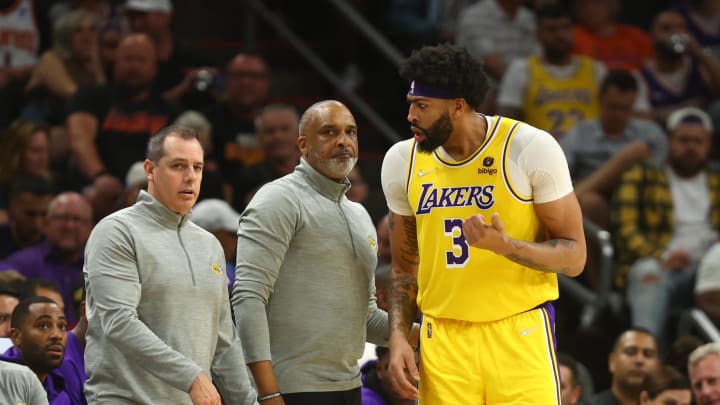 Apr 5, 2022; Phoenix, Arizona, USA; Los Angeles Lakers head coach Frank Vogel (left), assistant coach Phil Handy (center) and forward Anthony Davis (3) against the Phoenix Suns at Footprint Center. Mandatory Credit: Mark J. Rebilas-USA TODAY Sports