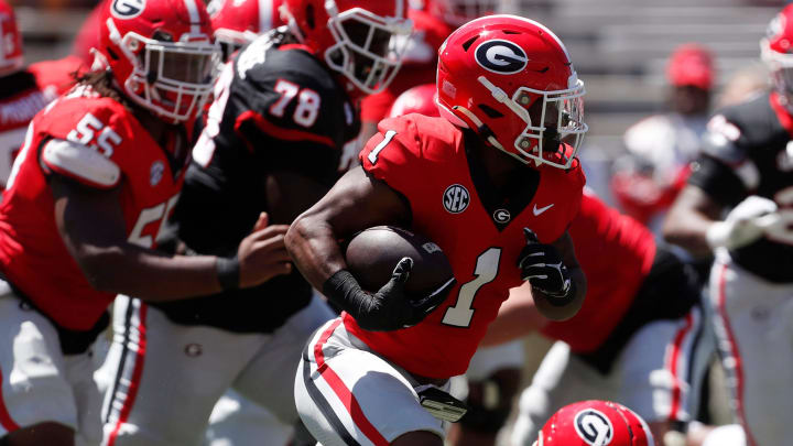 Georgia running back Trevor Etienne (1) moves the ball down the field during the G-Day spring football game in Athens, Ga., on Saturday, April 13, 2024.