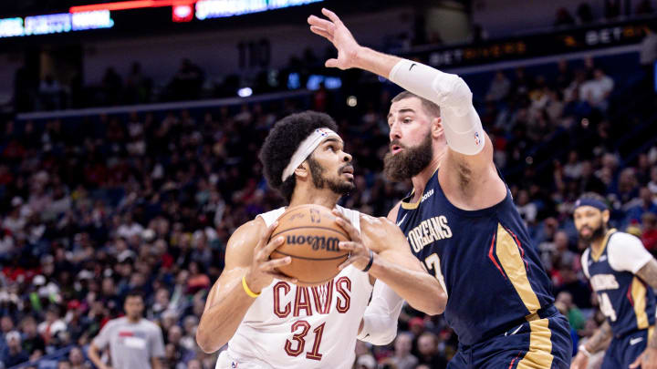 Mar 13, 2024; New Orleans, Louisiana, USA; Cleveland Cavaliers center Jarrett Allen (31) drives to the basket against New Orleans Pelicans center Jonas Valanciunas (17) during the first half at Smoothie King Center. Mandatory Credit: Stephen Lew-USA TODAY Sports