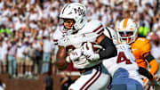 Mississippi State Bulldogs running back Fluff Bothwell (24) runs with the ball against the Tennessee Volunteers during the first half at Davis Wade Stadium at Scott Field.