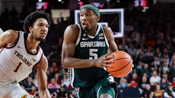 Feb 1, 2025; Los Angeles, California, USA;  Michigan State Spartans guard Tre Holloman (5) dribbles down the sideline against the USC Trojans at Galen Center. Mandatory Credit: William Navarro-Imagn Images