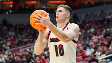 Louisville Cardinals guard Isaac McKneely (10) scores three of his 12 points in the first half against South Carolina State as the Cards led 59-15 at the half at the KFC Yum! Center Monday night, Nov. 3, 2025.