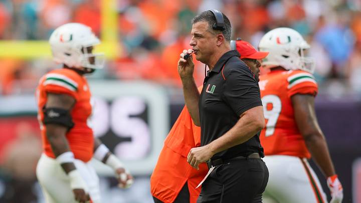 Sep 9, 2023; Miami Gardens, Florida, USA; Miami Hurricanes head coach Mario Cristobal looks on against the Texas A&M Aggies during the first quarter at Hard Rock Stadium. Mandatory Credit: Sam Navarro-USA TODAY Sports