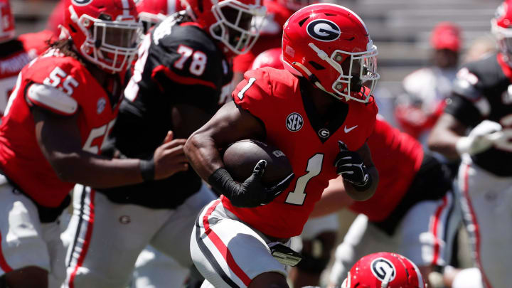 Georgia running back Trevor Etienne (1) moves the ball down the field during the G-Day spring football game in Athens, Ga., on Saturday, April 13, 2024.