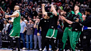 Jan 31, 2025; New Orleans, Louisiana, USA;  Boston Celtics guard Derrick White (9) and forward Sam Hauser (30) cheer as they defeat the New Orleans Pelicans  at Smoothie King Center. Mandatory Credit: Stephen Lew-Imagn Images