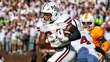 Mississippi State Bulldogs running back Fluff Bothwell (24) runs with the ball against the Tennessee Volunteers during the first half at Davis Wade Stadium at Scott Field.