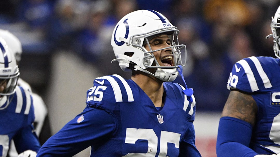 Dec 26, 2022; Indianapolis, Indiana, USA; Indianapolis Colts safety Rodney Thomas II (25) celebrates intercepting a pass during the first quarter against the Los Angeles Chargers at Lucas Oil Stadium.